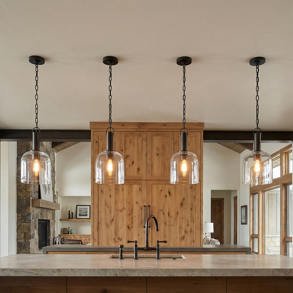 Emrys Pendant 8", Aged Iron geometric pendant in a Modern Farmhouse Kitchen with knotty wood cabinets & stone island.