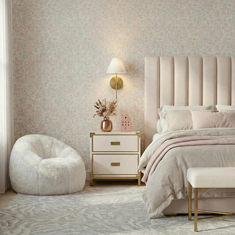 Bryson Wall Sconce 14", Modern Brass linear Wall Sconce in a Transitional Bedroom with a pink channeled headboard and floral wallpaper.