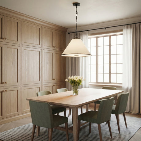 Gael Medium Pendant 22", Aged Iron geometric pendant in a Transitional Dining Room with a light wood dining table and green chairs.