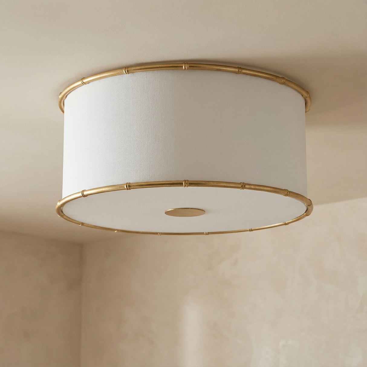 Gael Flush Mount 19", Gilded Brass linear flush mount in a Transitional Living Room.