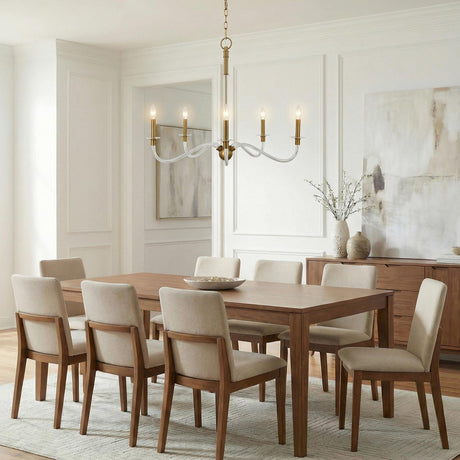 Brass and Clear linear chandelier in a Transitional Dining Room with a wooden dining table and chairs.