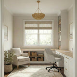 Floren Small Pendant 16", Aged Gilded Brass leaf design Pendant in a Transitional Office with a white built-in desk and patterned chair.