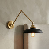 Franklin Adjustable Two Arm Wall Sconce for Industrial home with Gray Wall Siding