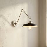 Franklin Adjustable Two Arm Wall Sconce, Matte Black and Polished Nickel for Modern home with White Textured Walls