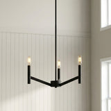 Foster 3 Light Pendant 18", Matte Black geometric Pendant in a Transitional Living Room with white shiplap walls.