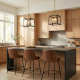 Fillmore Medium Lantern Pendant 13", Matte Black and Modern Brass geometric lantern Pendant in a Modern Farmhouse Kitchen with a black island.