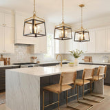 Fillmore Medium Lantern Pendant 13", Matte Black and Brass geometric Pendant in a Modern Farmhouse Kitchen with a white marble island.