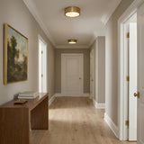 Neal Medium Flush Mount 13", Satin Brass geometric flush mount in a Transitional Hallway with a walnut console table and framed art.