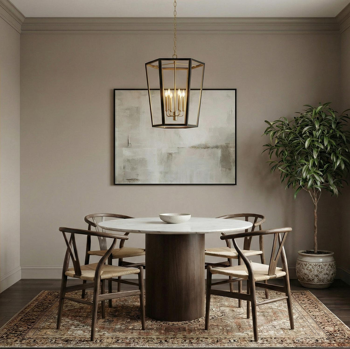 Rawlin Lantern Pendant, Matte Black and Gold geometric pendant in a Transitional Dining Room with a marble table and wishbone chairs.