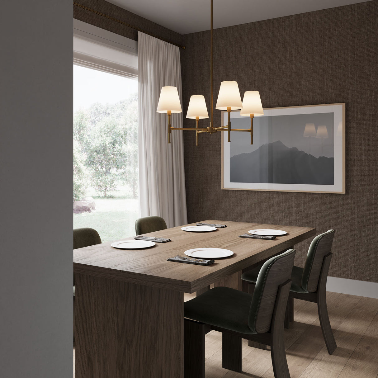 Declan 4 Light Chandelier 28", in Satin Brass hung above a modern wood dining table with seating for 4