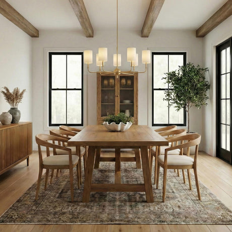 Remington 9 Light Chandelier 36", Satin Brass linear Chandelier in a Modern Farmhouse Dining Room with a rustic oak table.