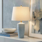 Ceramic Table Lamp, Baby Blue geometric Table Lamp in a Transitional Living Room with white console and abstract wall art.