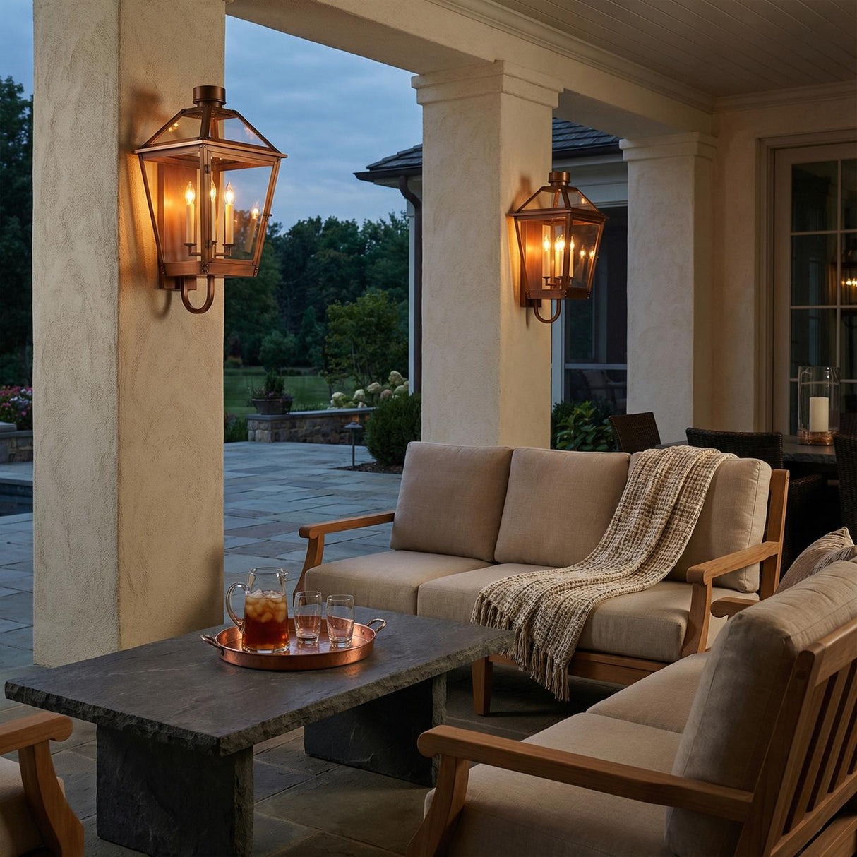 Fairmont Extra Large Outdoor Wall Light 28", Copper geometric Outdoor Wall in a Transitional Outdoor with a light wood sofa and stone coffee table.