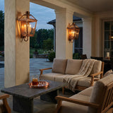 Fairmont Extra Large Outdoor Wall Light 28", Copper geometric Outdoor Wall in a Transitional Outdoor with a light wood sofa and stone coffee table.