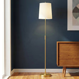 Petra Floor Lamp 65", Modern Brass linear Floor Lamp in a Mid-Century Living Room with a Mid-Century wood cabinet.