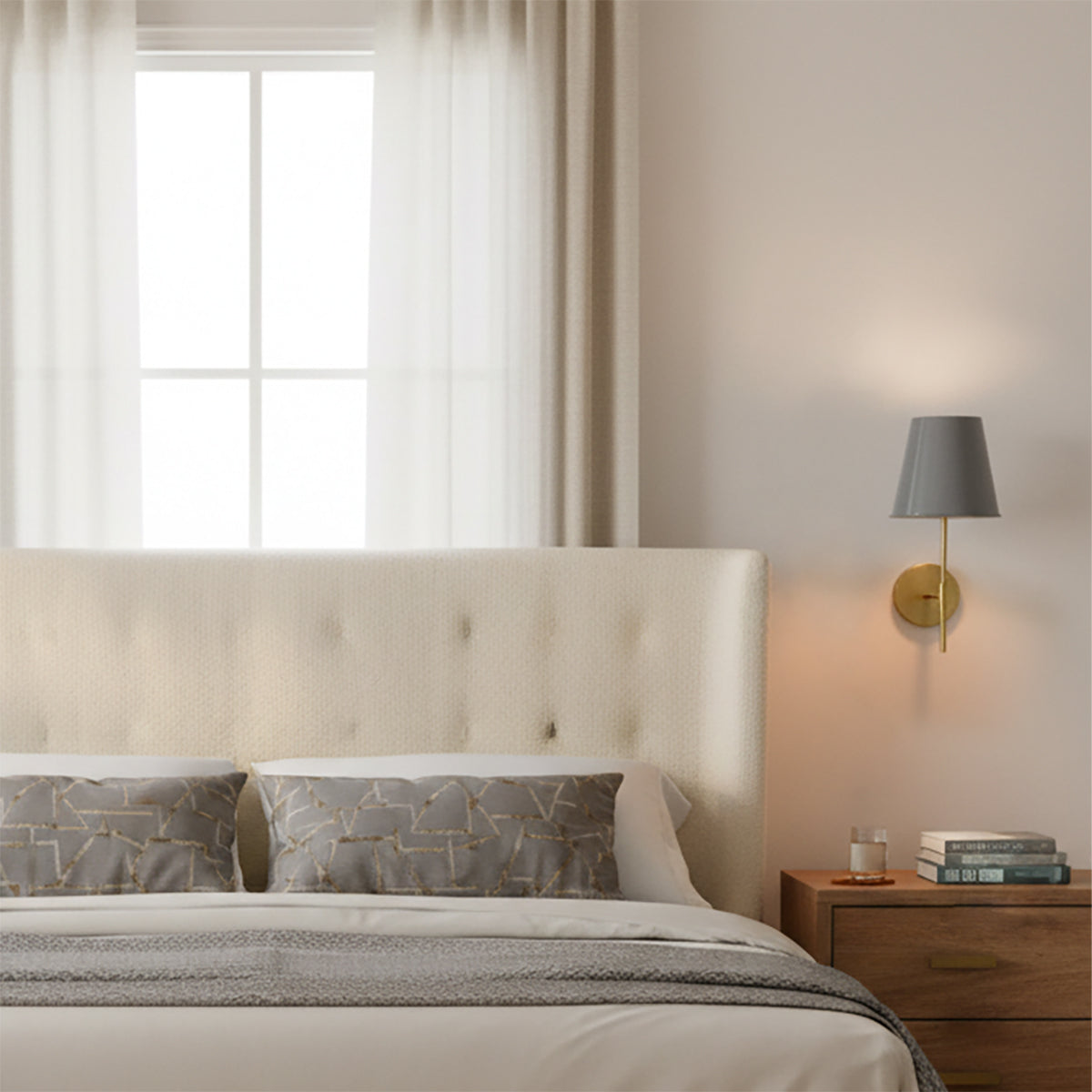 Weston Medium Wall Sconce 17, Gray and Satin Brass - Sconce illuminating a bedside table in a neutral bedroom