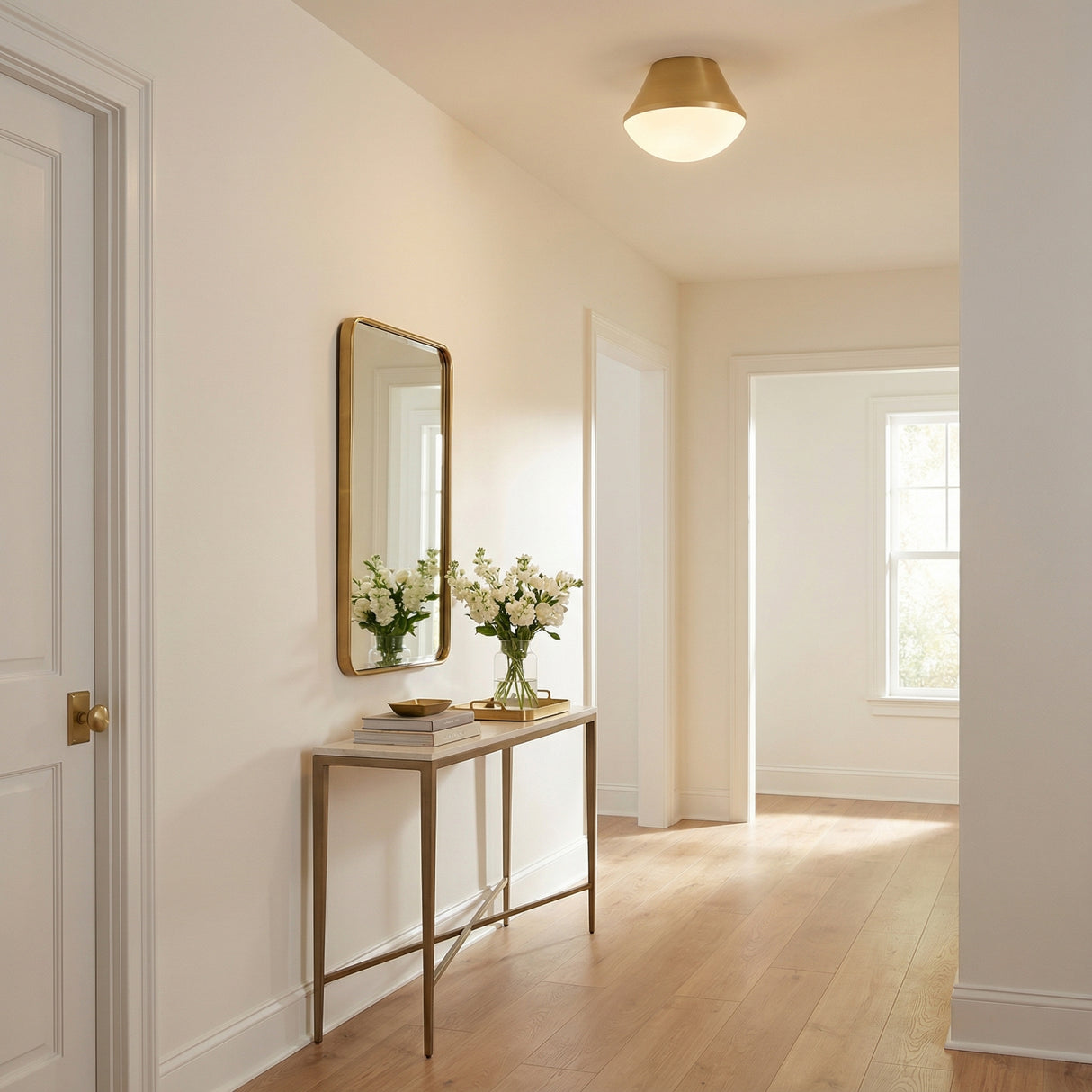 Skylar Flush Mount 11", Satin Brass geometric flush mount in a Transitional Entryway with a gold mirror and marble console table.