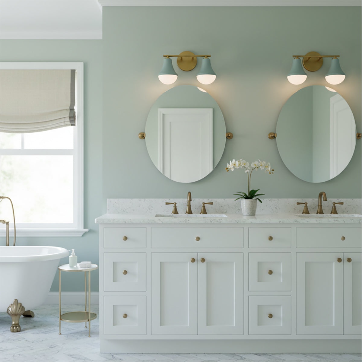 Skylar 2 Light Vanity - Two double light fixtures above circular mirrors, over a white double vanity with brass faucets and a white bathtub to the left.