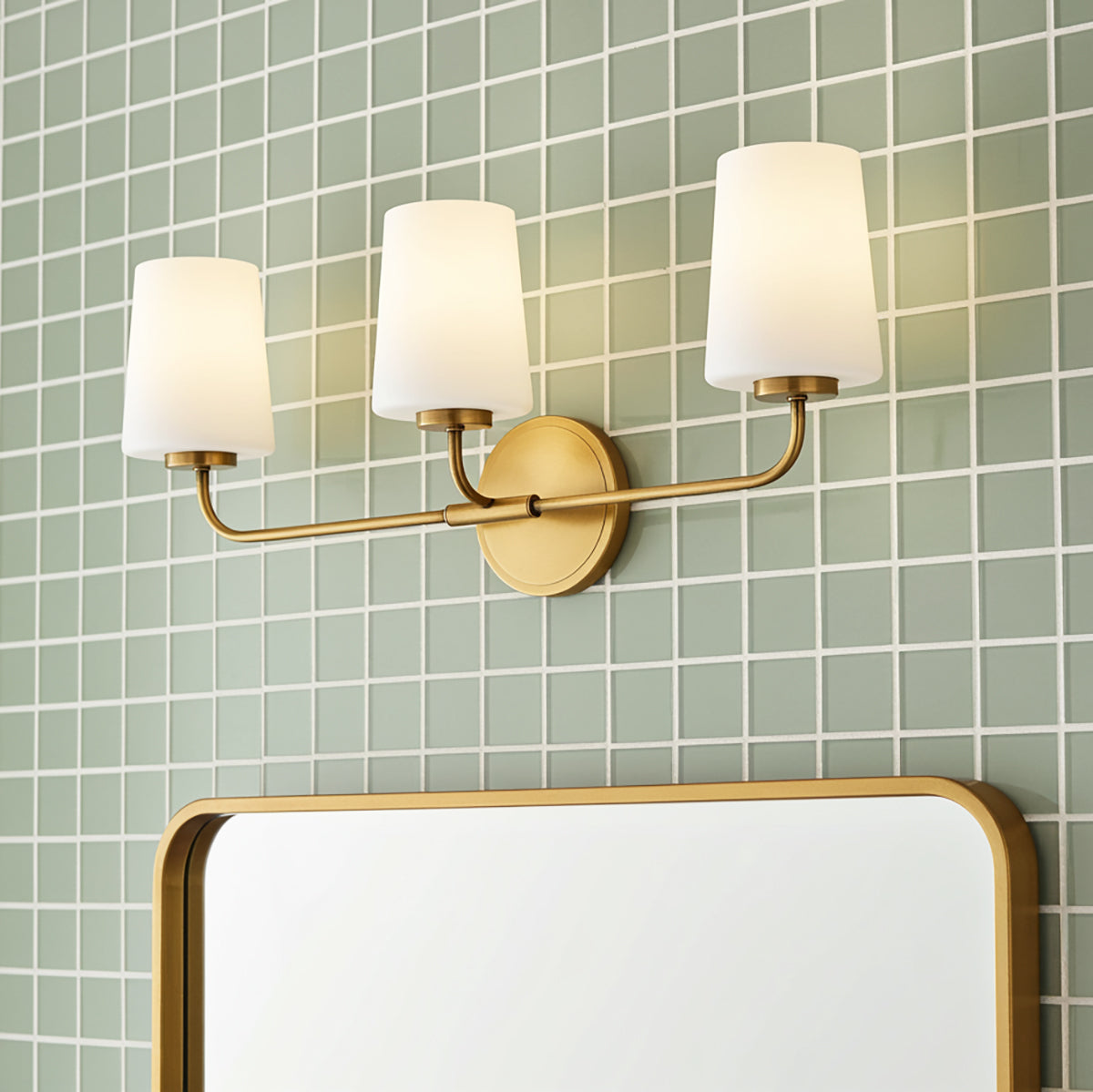Wyatt 3 Light Vanity, Legacy Brass with Milk Glass for Modern home with Green Tile
