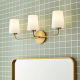 Wyatt 3 Light Vanity, Legacy Brass with Milk Glass for Modern home with Green Tile