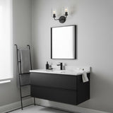 Wyatt 2 Light Vanity, Black with Clear Glass - Black vanity light with clear glass shades above a black framed mirror.