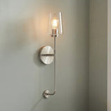 Brushed Nickel with Clear Glass linear wall sconce in a Modern Entryway.