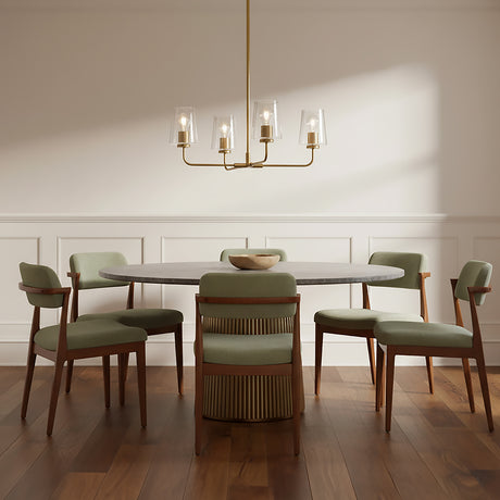 Wyatt 4 Light Chandelier 25 - A modern dining room with a satin brass chandelier, a gray oval table, and sage green chairs.