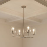 Wyatt 4 Light Chandelier 25", Brushed Nickel with Clear Glass for Modern home with White Siding