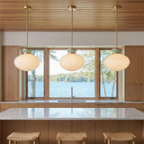 Piper Medium Pendant 15" for Modern home with Natural Wood Siding