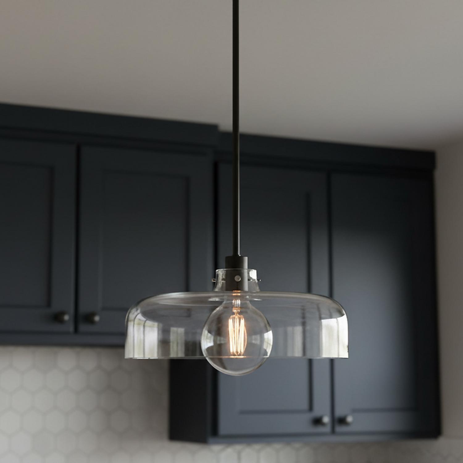 A modern kitchen features the matte black Alder Pendant 15
