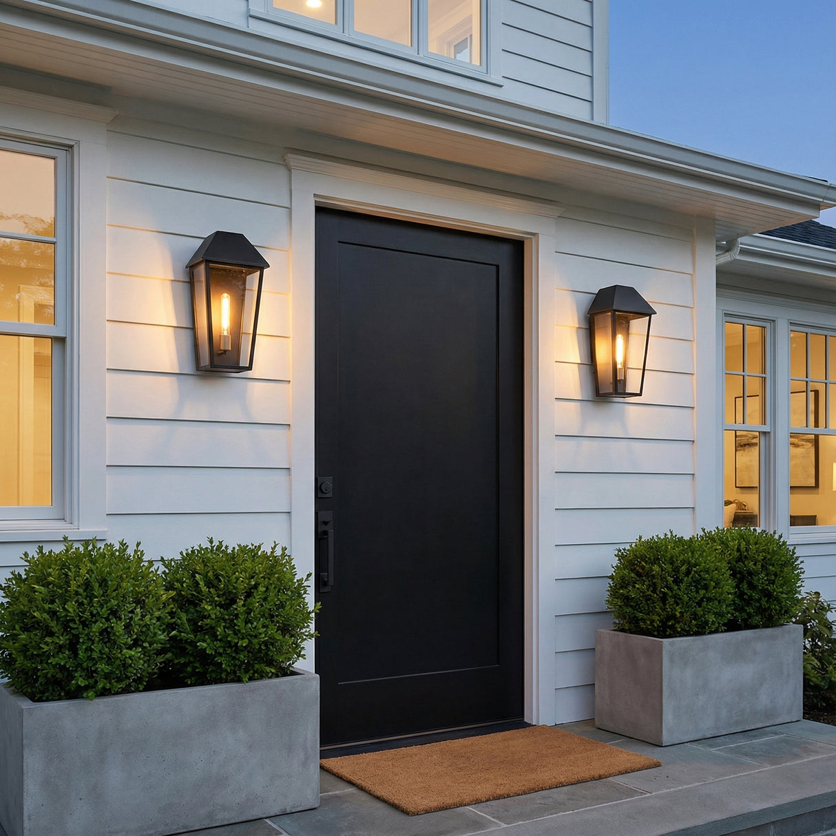 Lorimor Outdoor Wall Light, Large 19" Black geometric Outdoor Wall in a Transitional Outdoor with a black door.