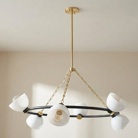 Penrose 6 Light Chandelier 43", Aged Brass and Textured Black in a Modern Living Room with painted walls