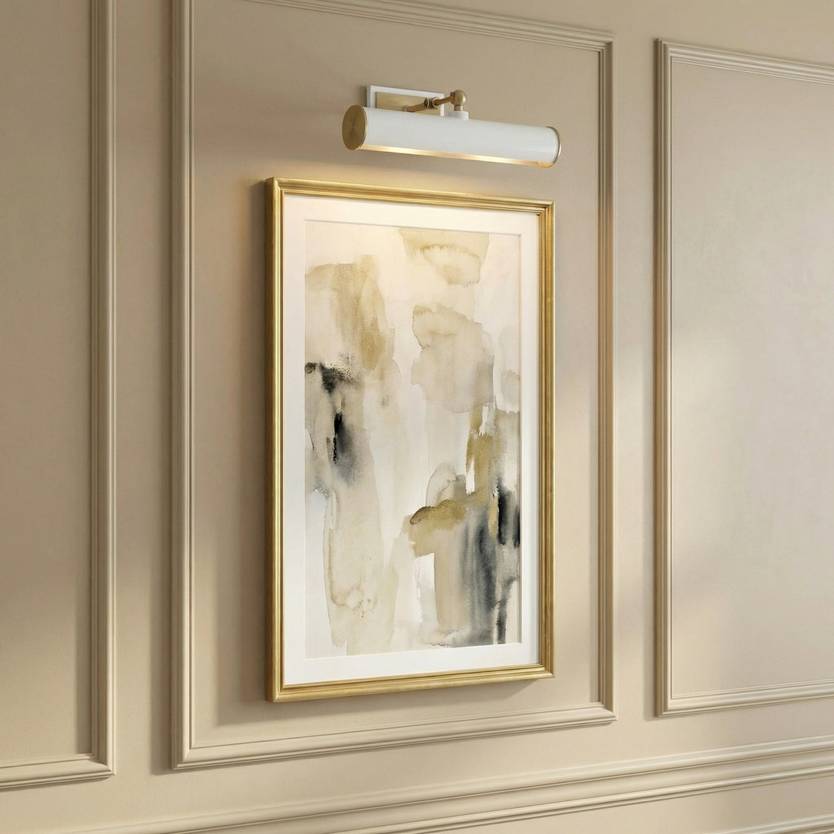 Judy Medium Picture Light 16", Aged Brass and White linear wall sconce in a Transitional Living Room with framed abstract art.