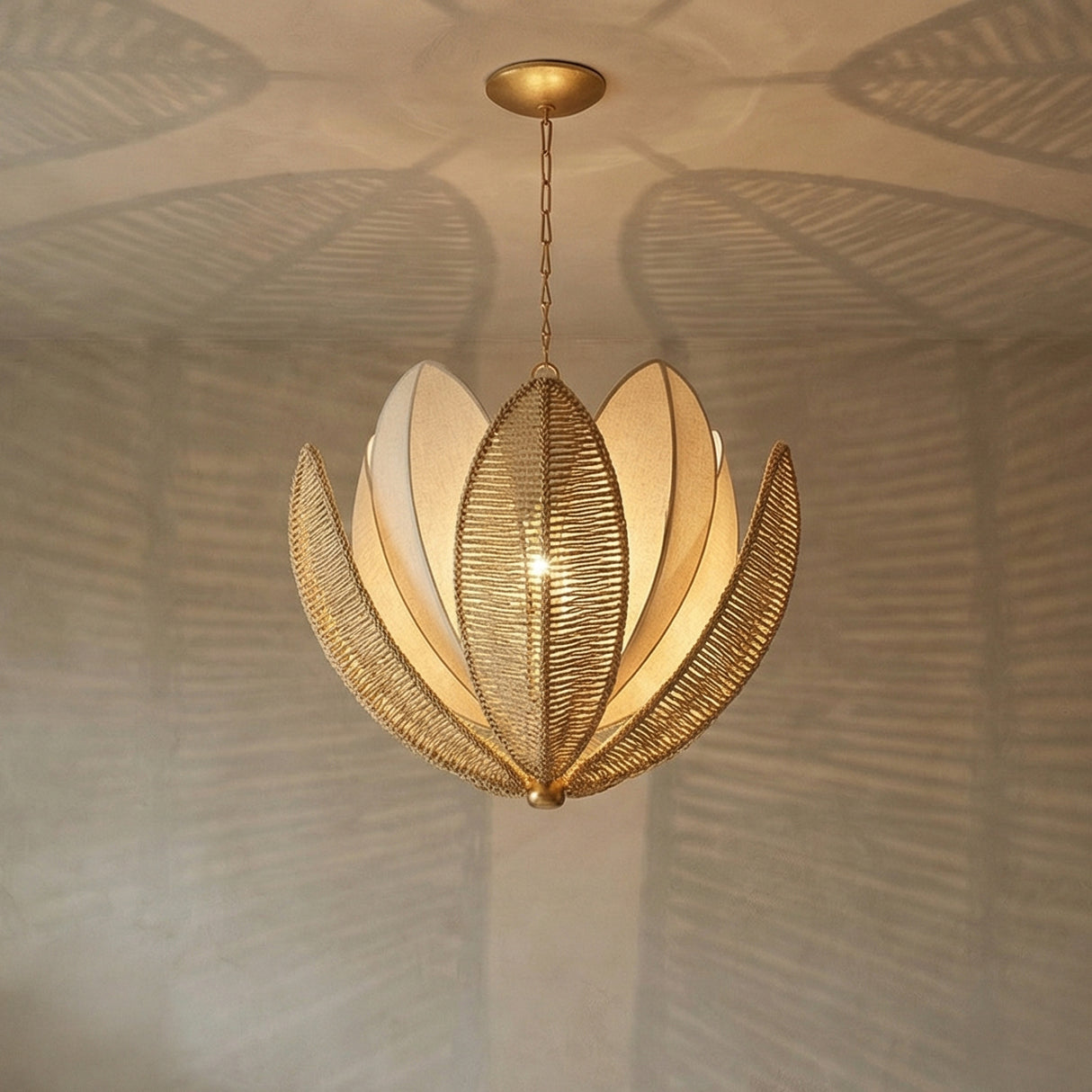 Gold and Natural Woven Lotus leaf design Chandelier in a Transitional Living Room.