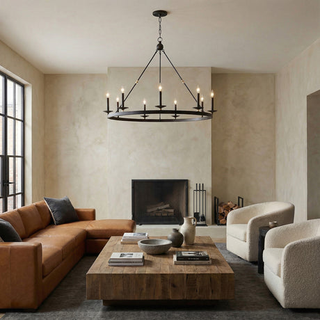 William 9 Light Ring Chandelier 46", Matte Black geometric chandelier in a Transitional Living Room with a brown leather sectional and rustic wood coffee table.