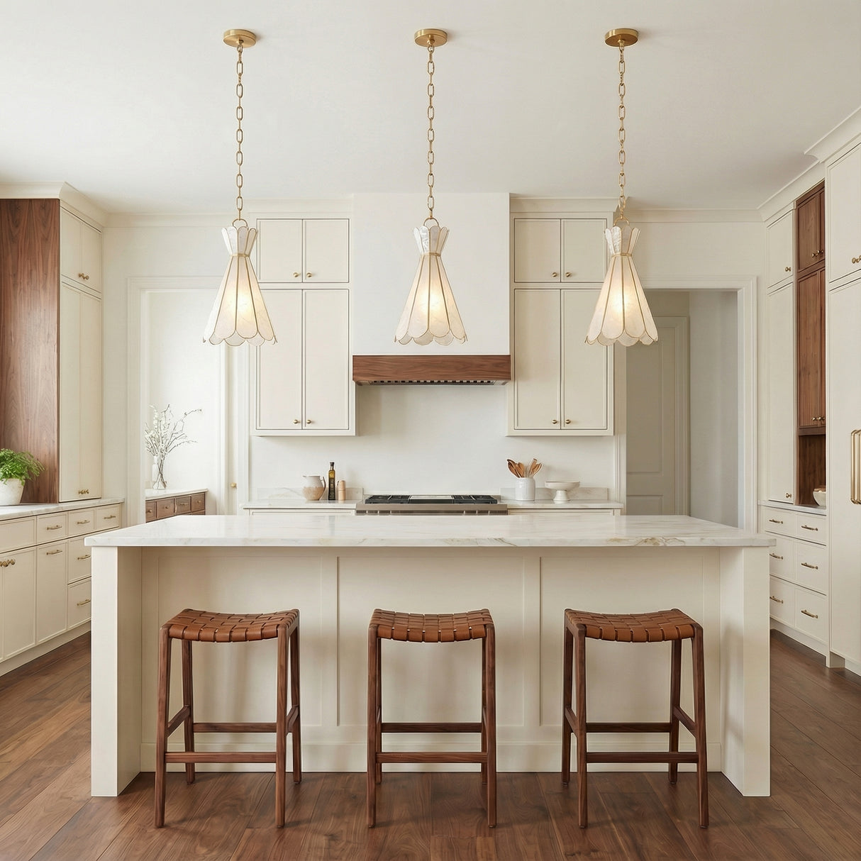 Winifred Pendant 10", Aged Brass scalloped pendant in a Transitional Kitchen with a white marble island & woven leather stools.