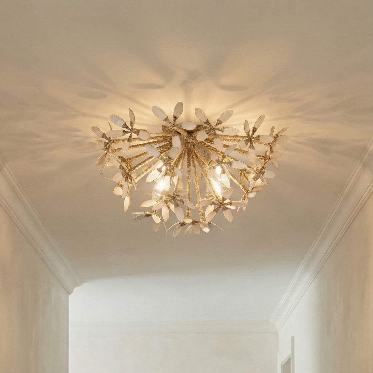 Genevieve Semi-Flush 20", Natural Rope and Coco Shells leaf design semi-flush in a Transitional Entryway with crown molding.