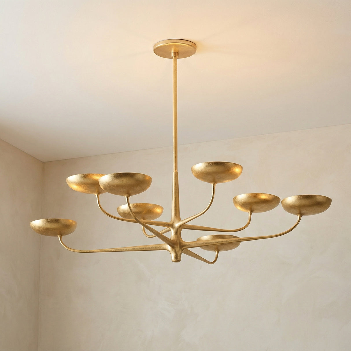 Reverie 8 Light LED Chandelier 45 Gold Leaf globe chandelier in a Contemporary Living Room with subtle wall texture.