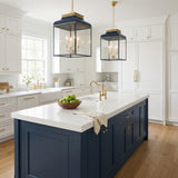 Harriet, Midnight Blue & Aged Brass geometric pendant in a Transitional Kitchen with navy island & white quartz countertops.