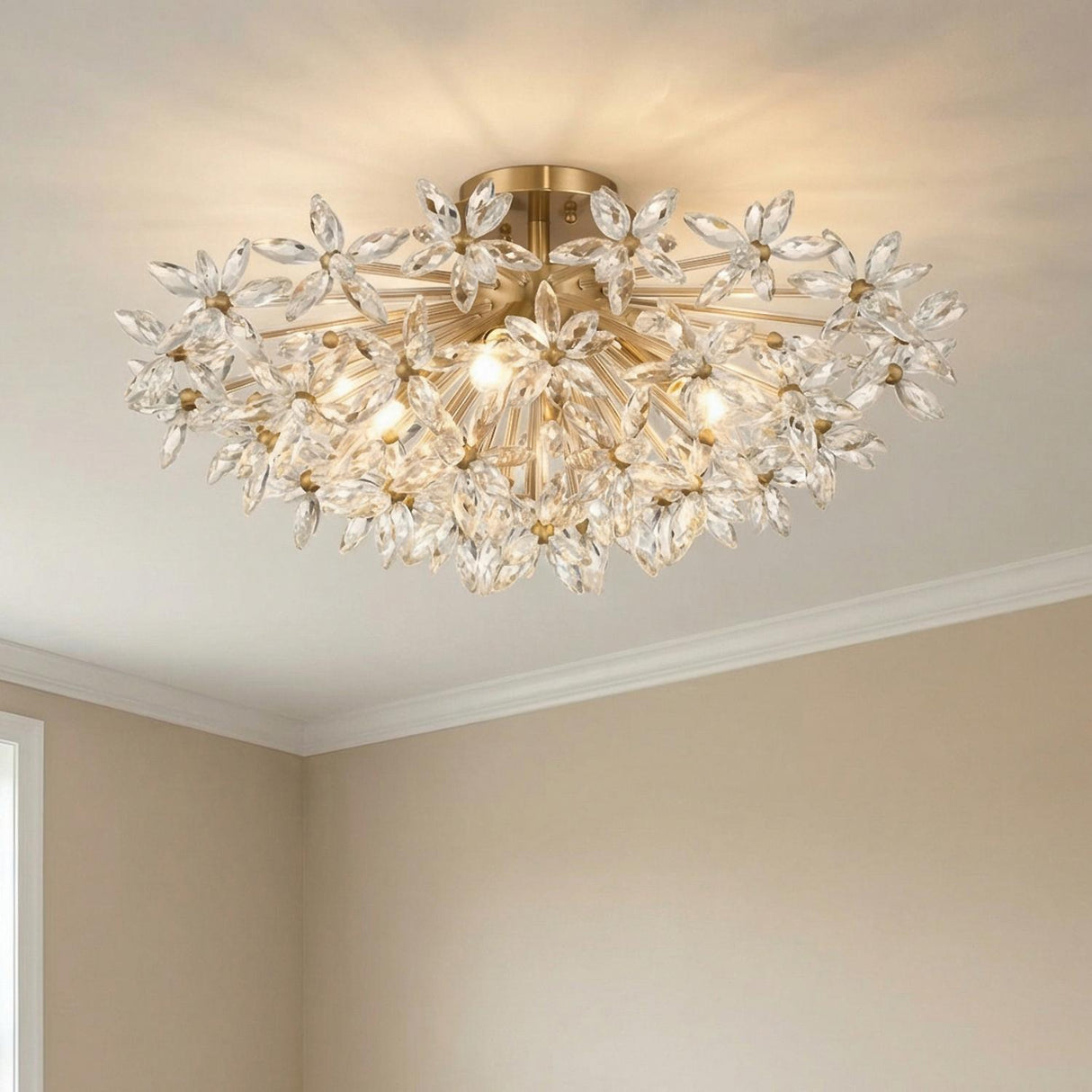 Eliana Semi-Flush 25", Aged Brass leaf design flush mount in a Transitional Living Room with beige walls and white crown molding.