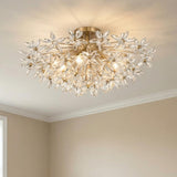 Eliana Semi-Flush 25", Aged Brass leaf design flush mount in a Transitional Living Room with beige walls and white crown molding.