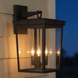Radcliffe Outdoor Wall Light, Old Bronze geometric Outdoor Wall in a Transitional Outdoor with cream horizontal siding.