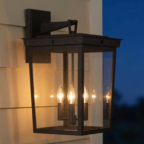 Radcliffe Outdoor Wall Light, Old Bronze geometric Outdoor Wall in a Transitional Outdoor with cream horizontal siding.