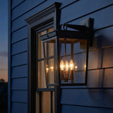 Radcliffe Outdoor Wall Light, Large 20", Old Bronze geometric Outdoor Wall in a Craftsman Outdoor space with blue lap siding.