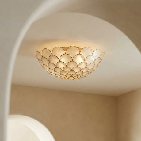 Valentina Semi-Flush 16", Soft Brass and Capiz Shell scalloped flush mount in a Mediterranean Entryway with arched plaster walls.