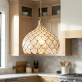 Valentina Medium Pendant 14", Soft Brass and Capiz Shell scalloped Pendant in a Transitional Kitchen with light wood cabinets.