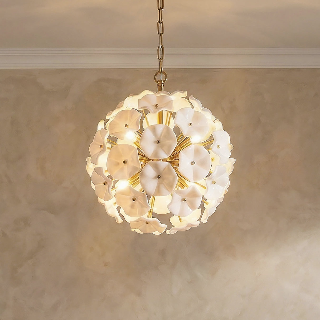 Layla Medium Pendant 18", White Glass Gold scalloped Pendant in a Mediterranean Living Room with a textured limewash wall.