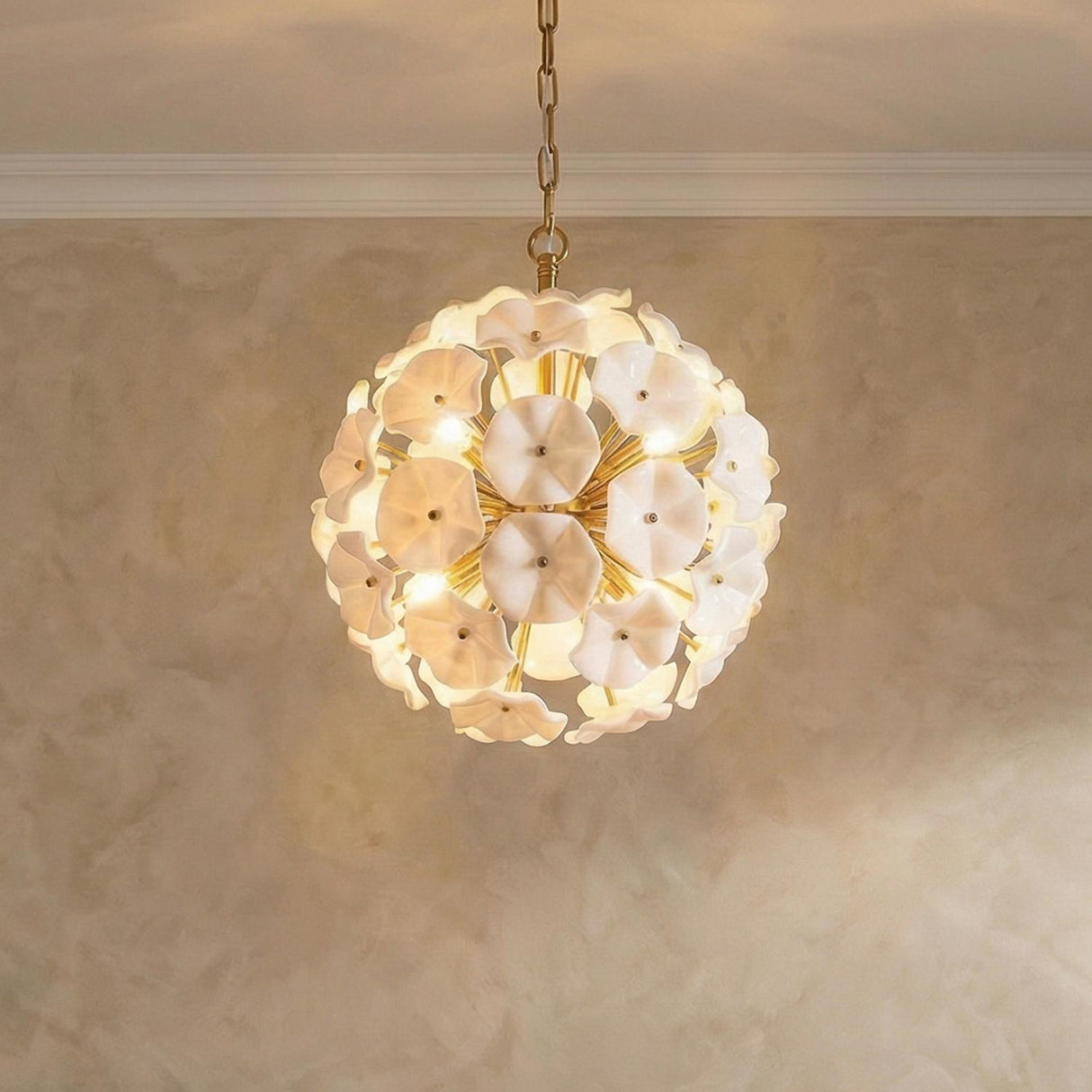 Layla Medium Pendant 18", White Glass Gold scalloped Pendant in a Mediterranean Living Room with a textured limewash wall.