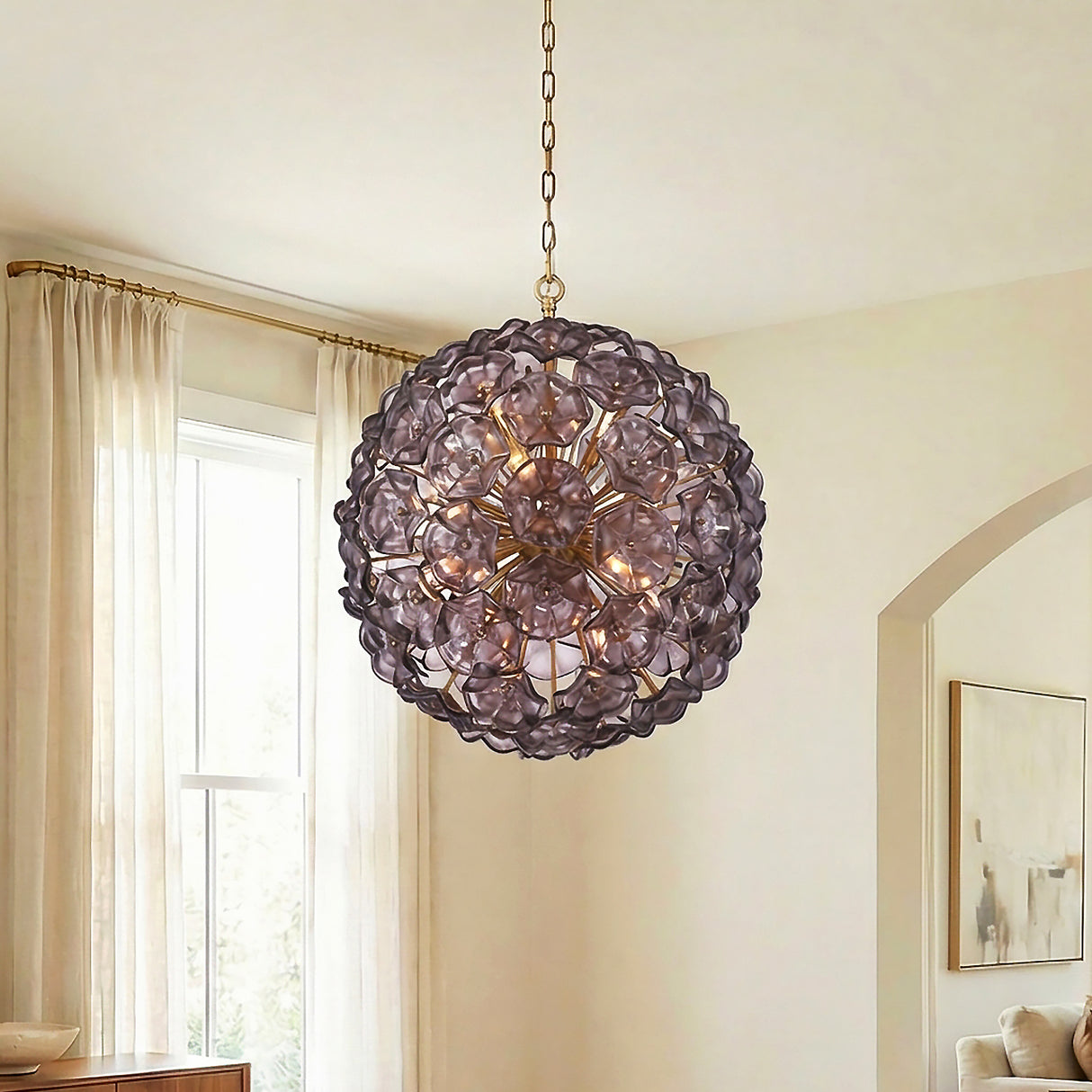 Layla Extra Large Pendant 28", Smoke Glass Brass scalloped Pendant in a Transitional Living Room with cream curtains and wooden buffet.