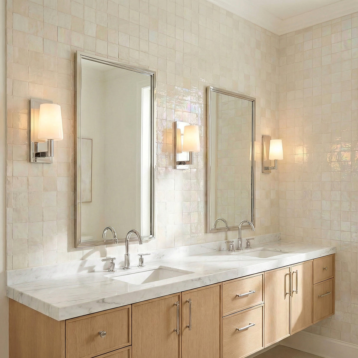 Fyn Wall Sconce 12", Chrome and with Opal Glass geometric Wall Sconce in a Transitional Bathroom with a double vanity and marble counter.